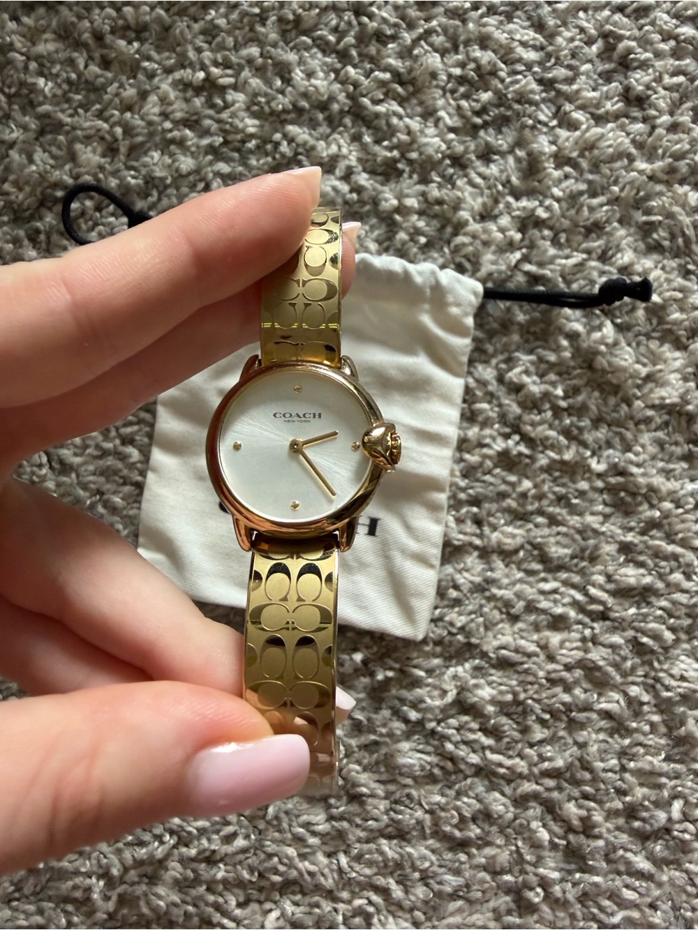 COACH Gold-Tone Signature Pattern Bangle Watch with White Dial